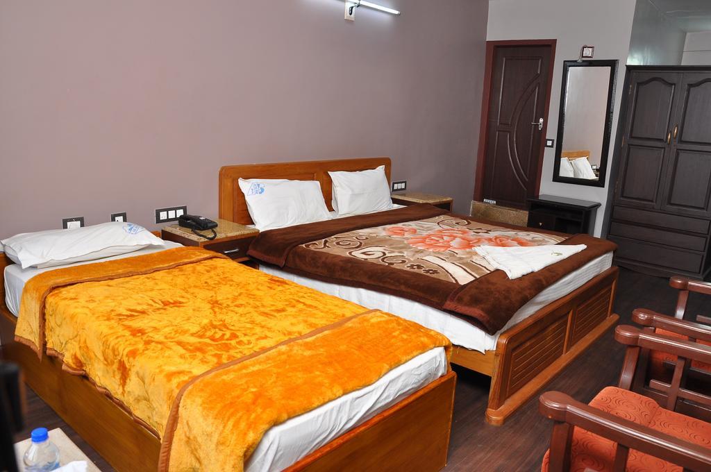 Grand Paradise Inn Kodaikanal Δωμάτιο φωτογραφία